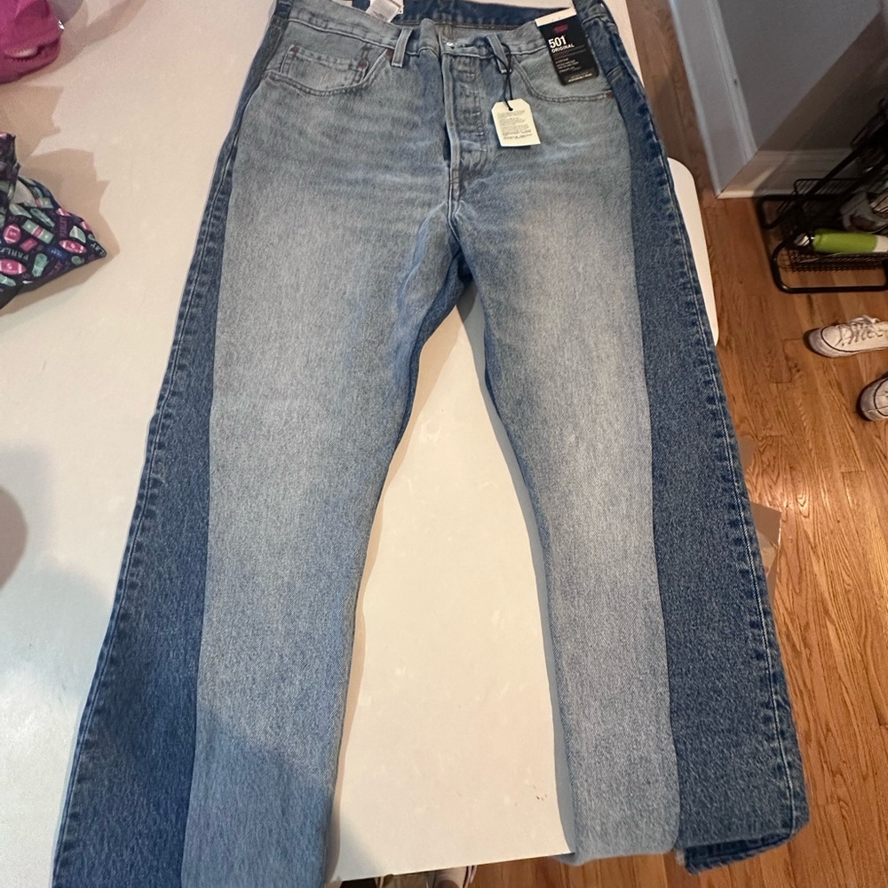 Never worn Levi’s Spliced Jeans size 31x32
